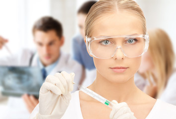 scientist holding thermometer