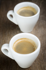 fine espresso in cup on table