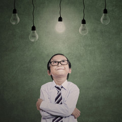 Close-up young businessman under lamps