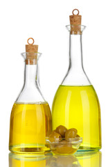 Original glass bottles with salad dressing isolated on white