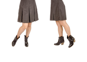 Woman Wearing Polka Dot Mini Skirt and Black Suede Pumps