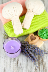 Still life with lavender candle, soap, massage balls, soap and