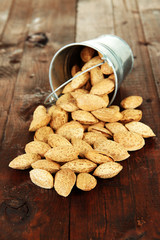 Almond on wooden background