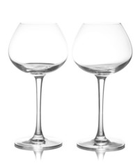 Empty wine glasses isolated on white