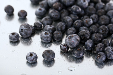 Blueberries on metal background