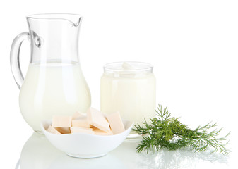 Fresh dairy products with greens isolated on white
