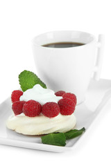 Tasty meringue cake with berries and cup of coffee, isolated