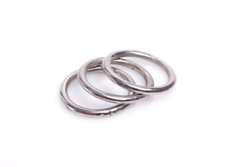 Naklejka premium metal rings completely isolated on white