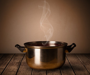 pot on old wooden table