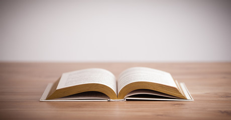 Open Book on wood background