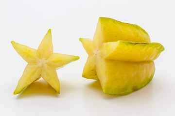 Fototapeta premium Dissect star fruit or Carambola isolated on white background