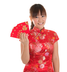 Chinese cheongsam girl showing red packets