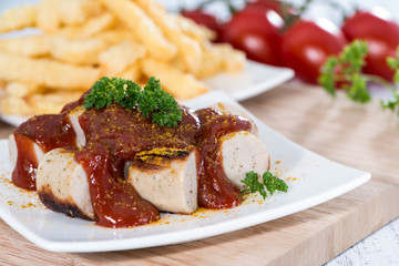Portion of Currywurst