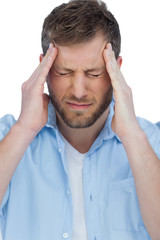 Naklejka premium Handsome model having headache and touching his forehead