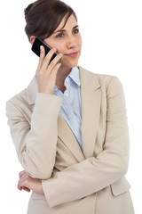 Pensive businesswoman on the phone