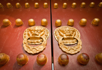 ancient red doors in Temple of Heaven, Beijing, China
