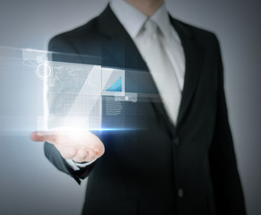businessman hand showing chart on virtual screen
