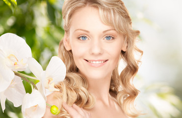 beautiful woman with orchid flower