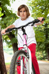 Naklejka premium Girl on bike