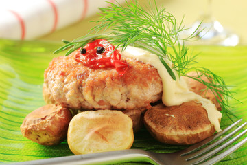 Burger and baked potatoes