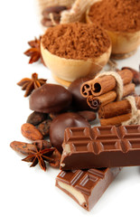 Composition of chocolate sweets, cocoa and spices, isolated