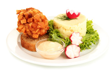 Chicken Kiev on croutons with mashed potatoes, isolated on