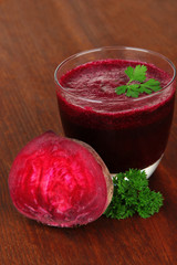 Fresh juice of beets on table close-up