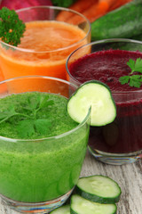 Fresh vegetable juices on table close-up