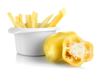 Bright fresh pepper cut up slices in bowl isolated on white