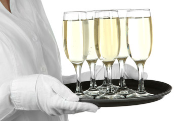 Waitresses holding tray with glasses of champagne, isolated