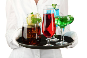 Waitresses holding tray with glasses of cocktails, isolated