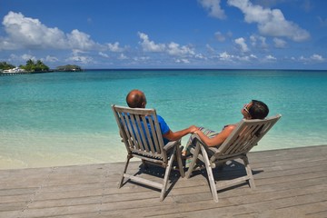 happy young couple have fun on beach