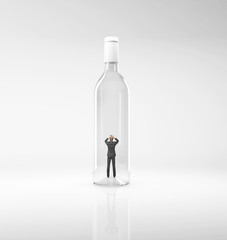 businessman inside a bottle