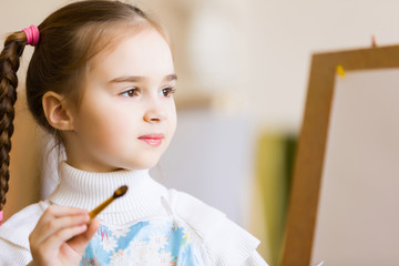 Cute girl painting