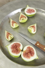 green fresh figs in a plate