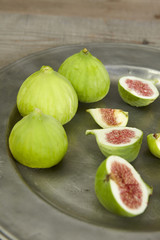 green fresh figs in a plate