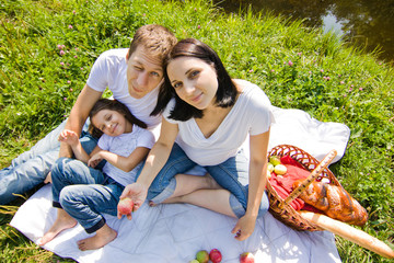 Family picnic near river