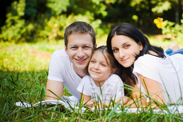 Fototapeta premium Family portrait in a park