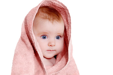 cheerful baby blue eyes in beige towel