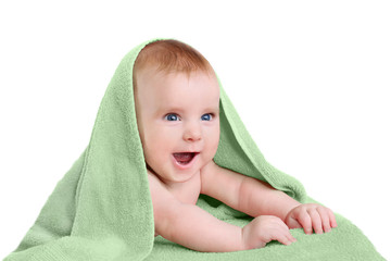 Happy baby in green towel