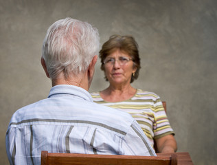 Elder man and woman chatting