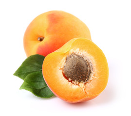 Ripe apricot with leaves