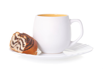 A cup of tea with a cake