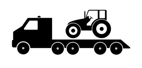 Tracteur dans un camion de dépannage