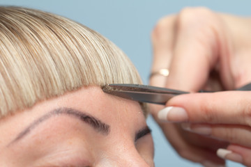 bangs haircut at the beauty salon