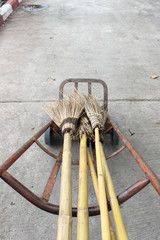 Old obsolete broom or besom leaning