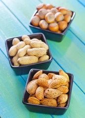 nuts in black bowls
