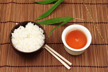 Rice and Tea On A Bamboo Mat