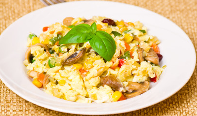 scrambled eggs with mushrooms and vegetables