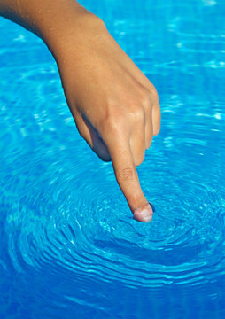 finger in the water